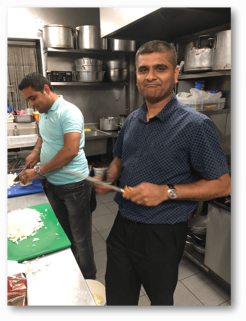Mr. Sailesh Kapadia and Mr. Rajiv Kalapi preparing the meal