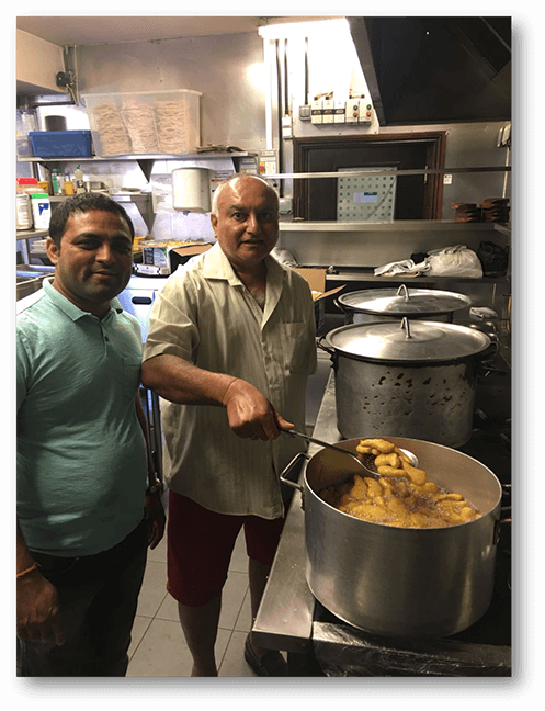 Vinesh Santilal, happy that the chicken nuggets are well cooked