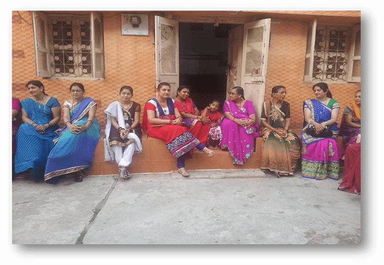 Womenfolk gathered in the chowk of the Totla Devi temple