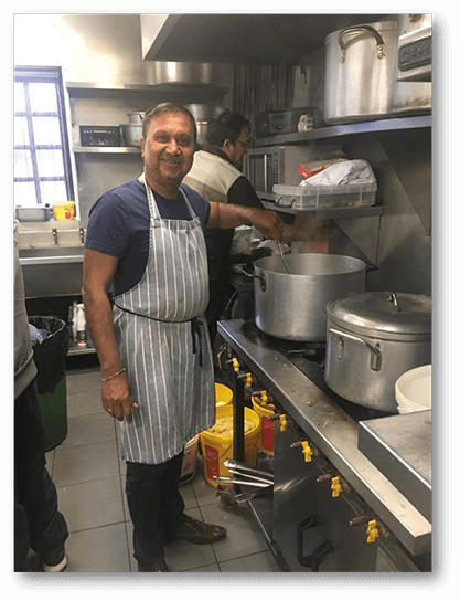 Mr. Dhirendra Santilal preparing meal