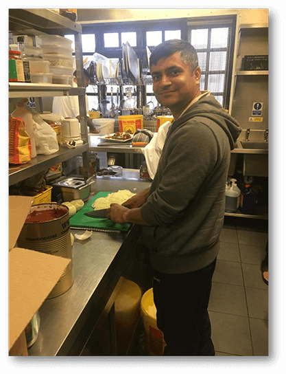 Mr. Jaydip Kalapi chopping onions